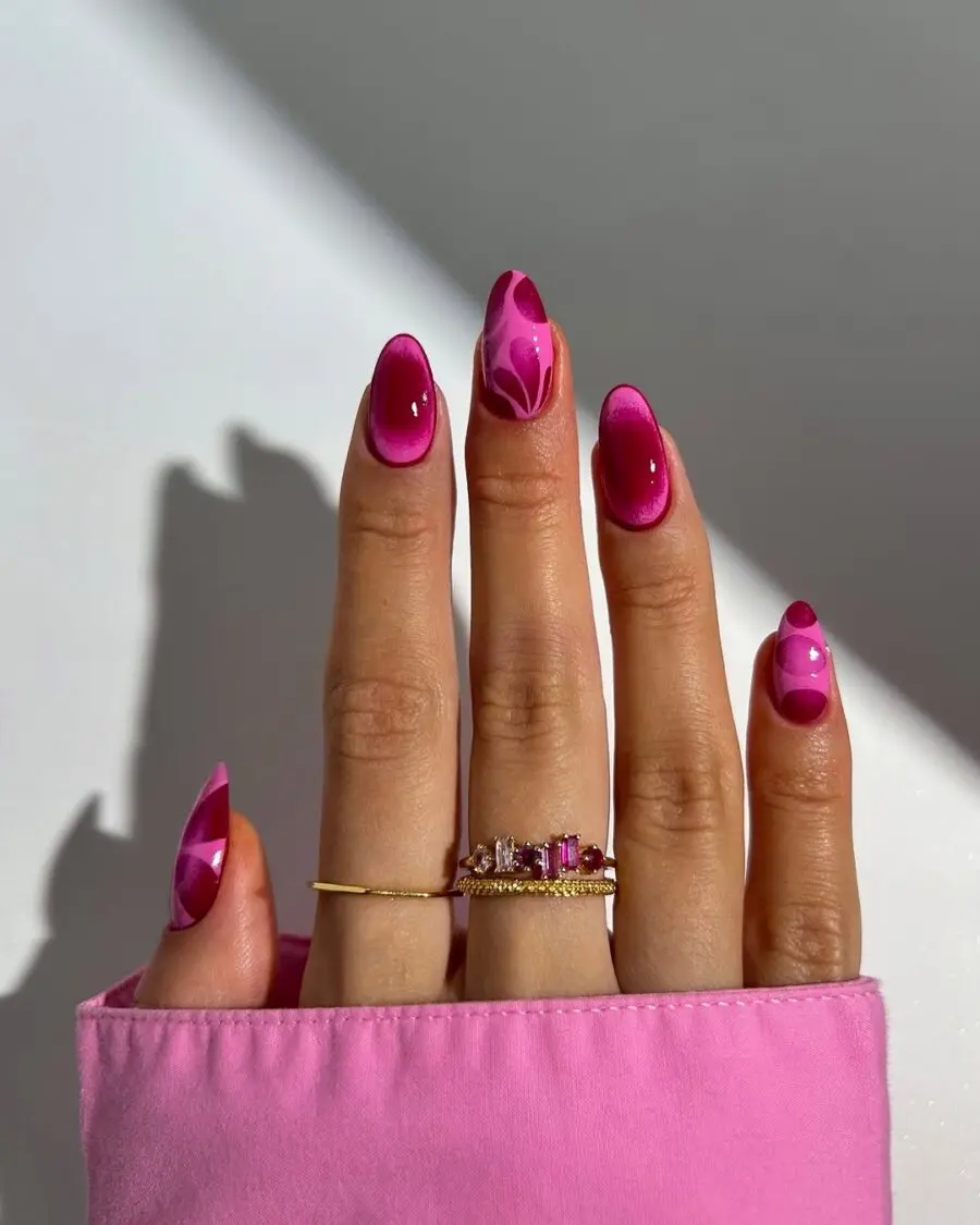 Vibrant pink aura nail art design