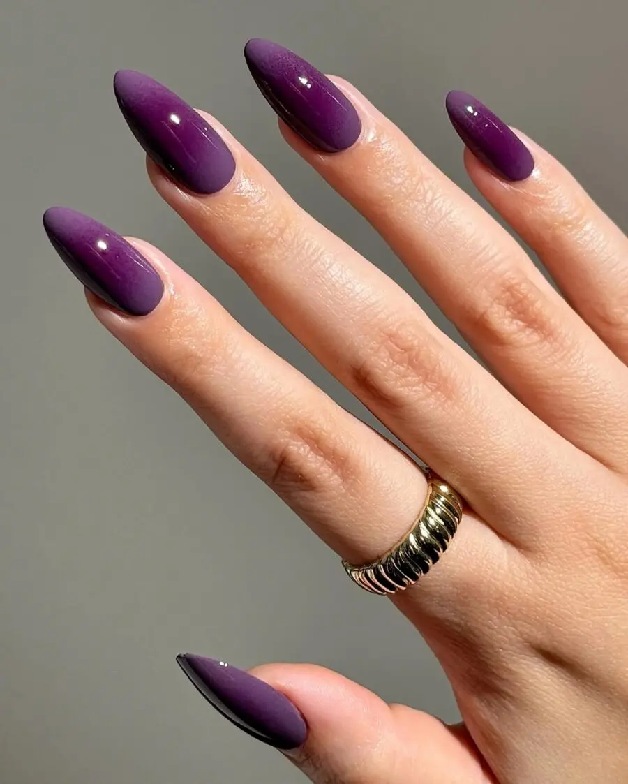 Stunning Stiletto Aura Nail Design in Purple