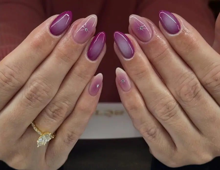 Stunning purple ombre aura nails with gems