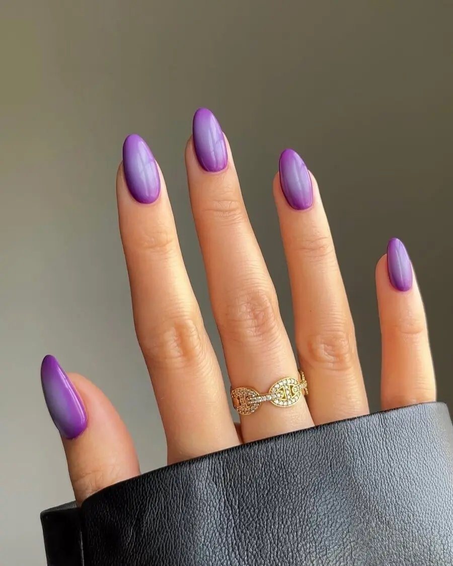 Stunning gradient aura nails in purple shades