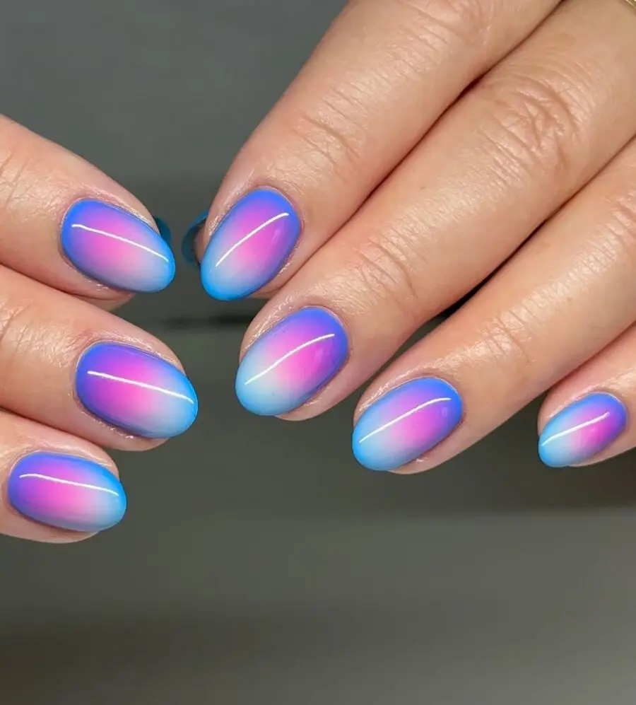 Trendy aura nails with a dreamy gradient.