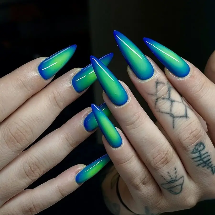 Stunning green-blue gradient aura stiletto nails