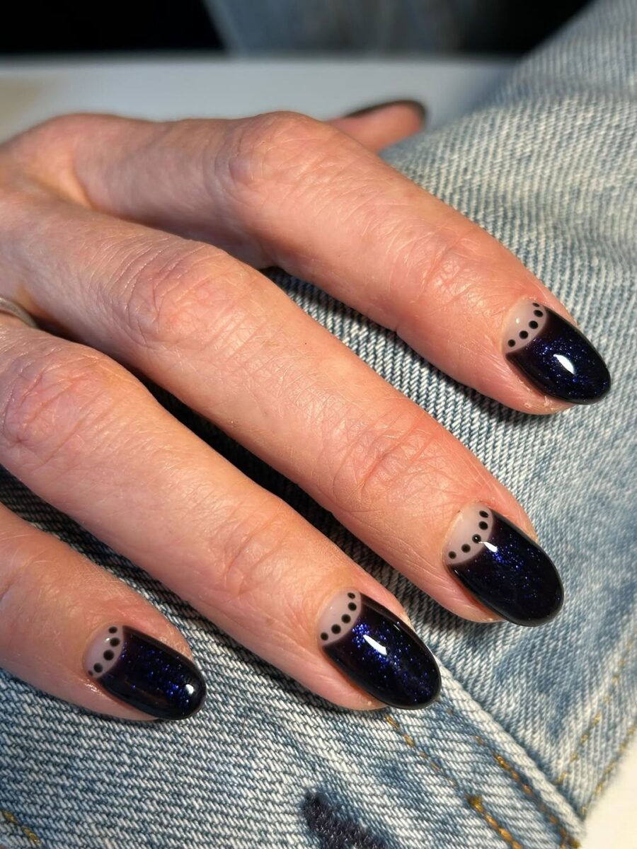 Chic navy glitter nails with playful dots