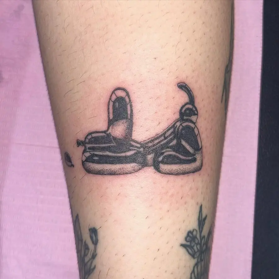 Unique balloon dog tattoo with intricate detailing