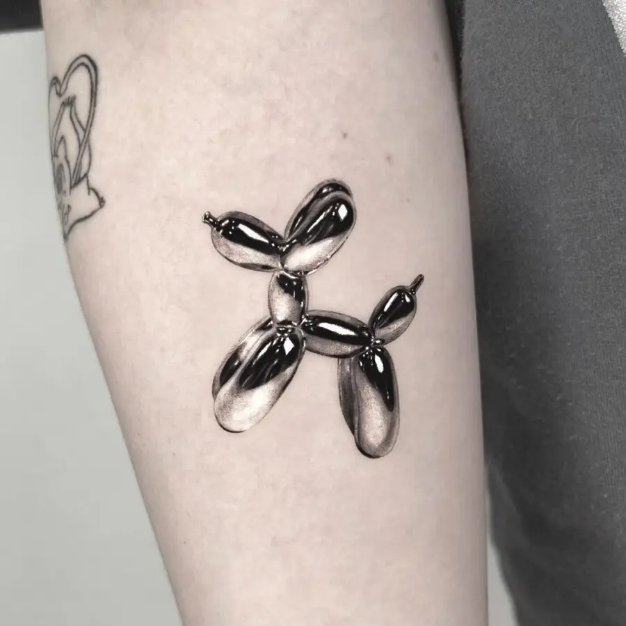 Stylish Balloon Dog Tattoo in Black Ink