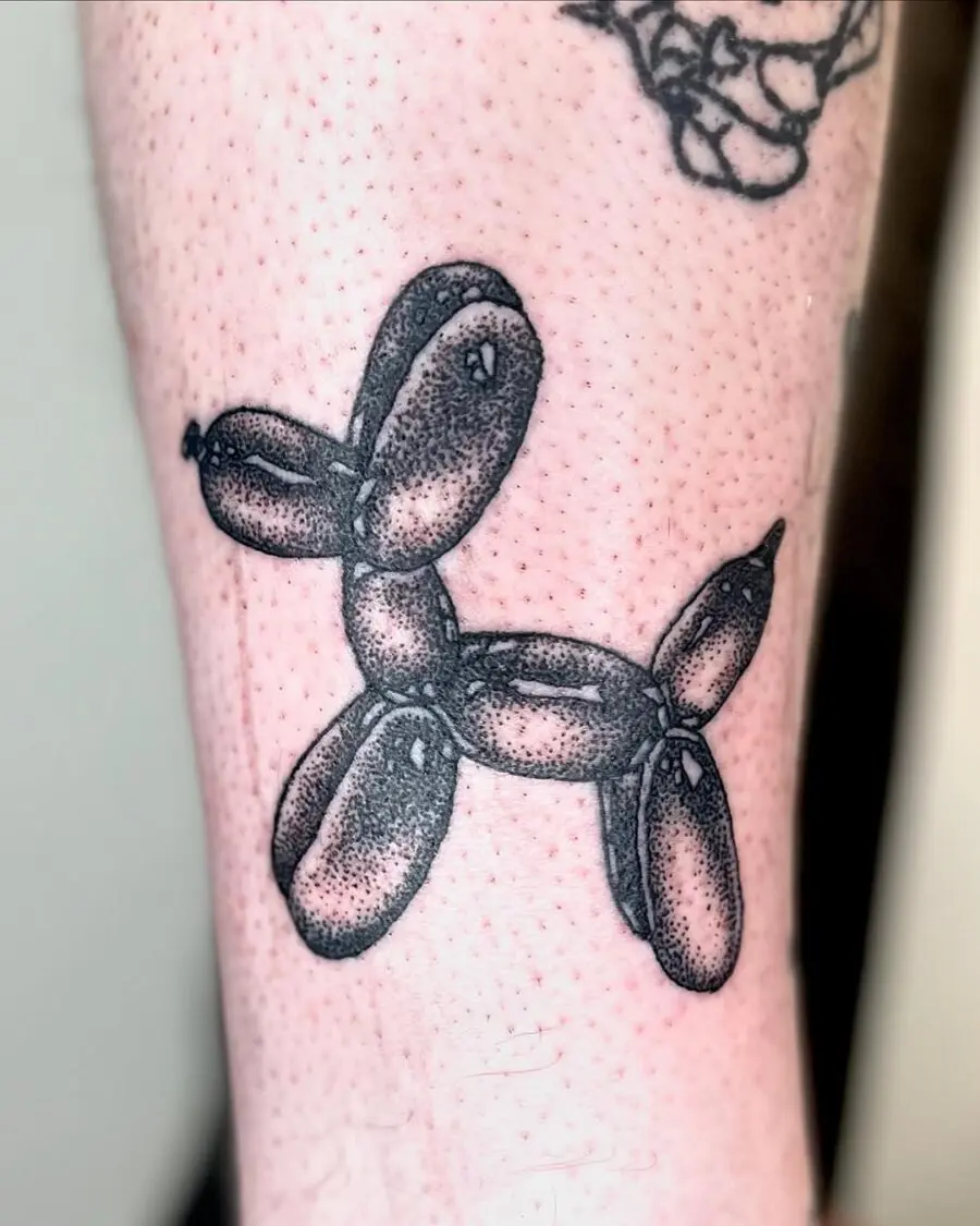 Stylish balloon dog tattoo in black and grey