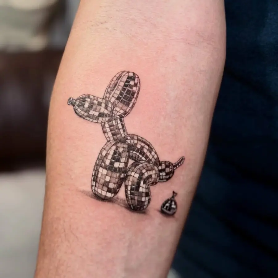 Unique checkered balloon dog tattoo design