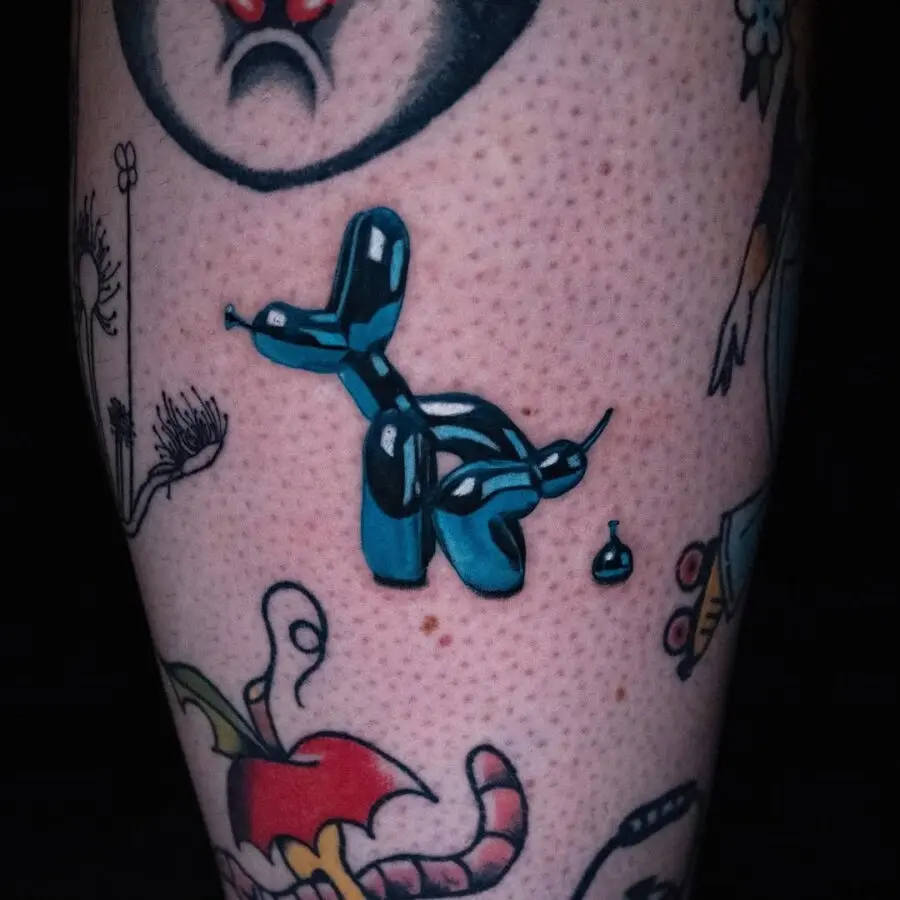 Whimsical balloon dog tattoo with vibrant colors