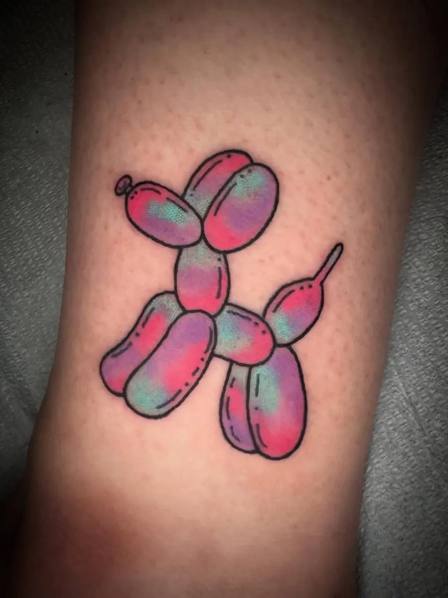 Vibrant Balloon Dog Tattoo in Playful Colors