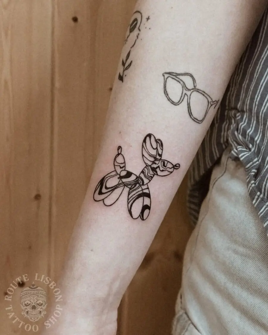 Whimsical balloon dog tattoo in minimalist style