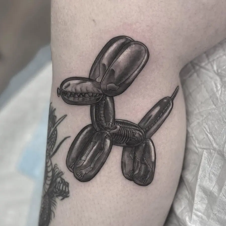 Realistic balloon dog tattoo with intricate details