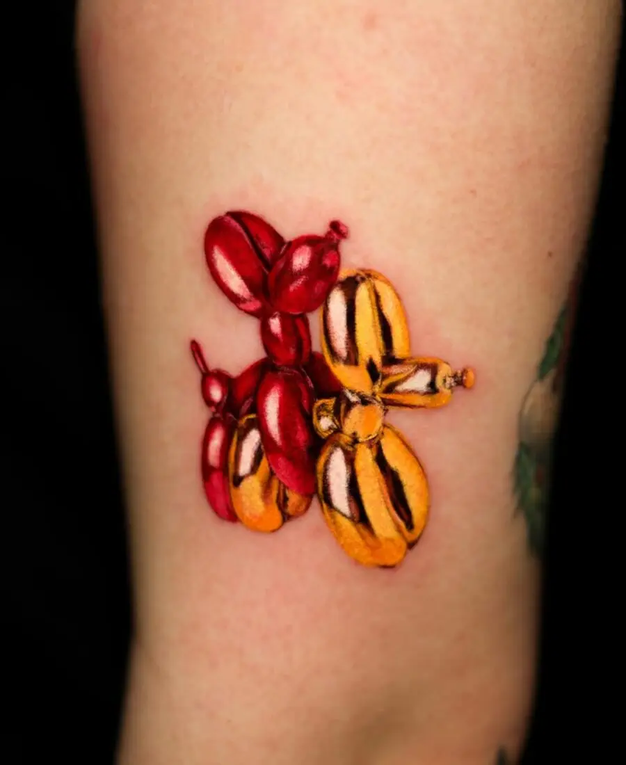 Vibrant Balloon Dog Tattoo in Bold Colors