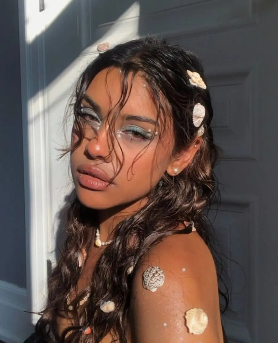 Radiant beach makeup with a coastal twist