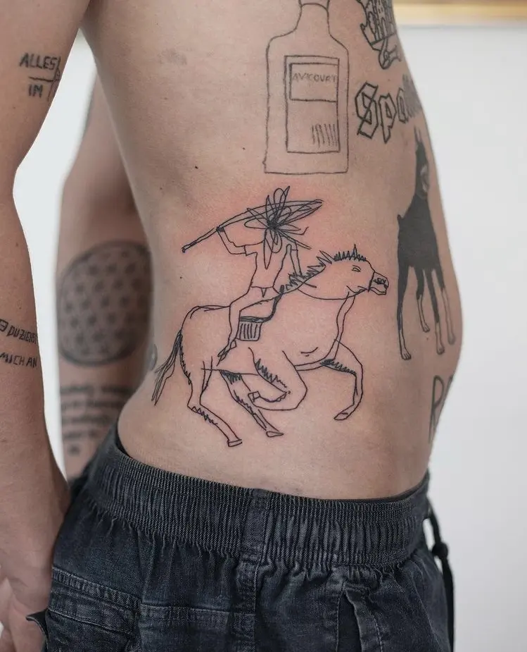 Dynamic horseman tattoo on the belly