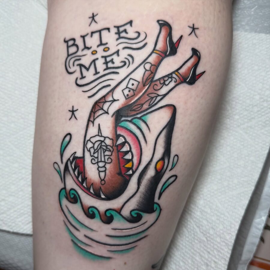 Dynamic shark and pinup tattoo with fierce vibes