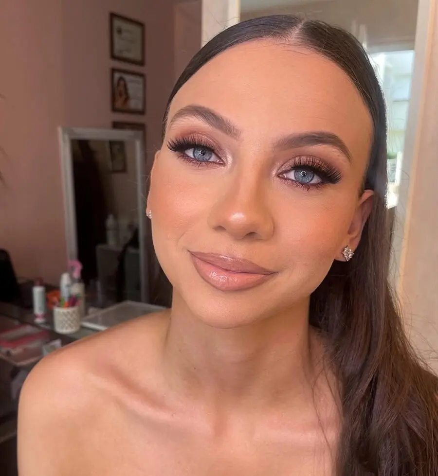 Gorgeous makeup enhancing blue eyes' sparkle