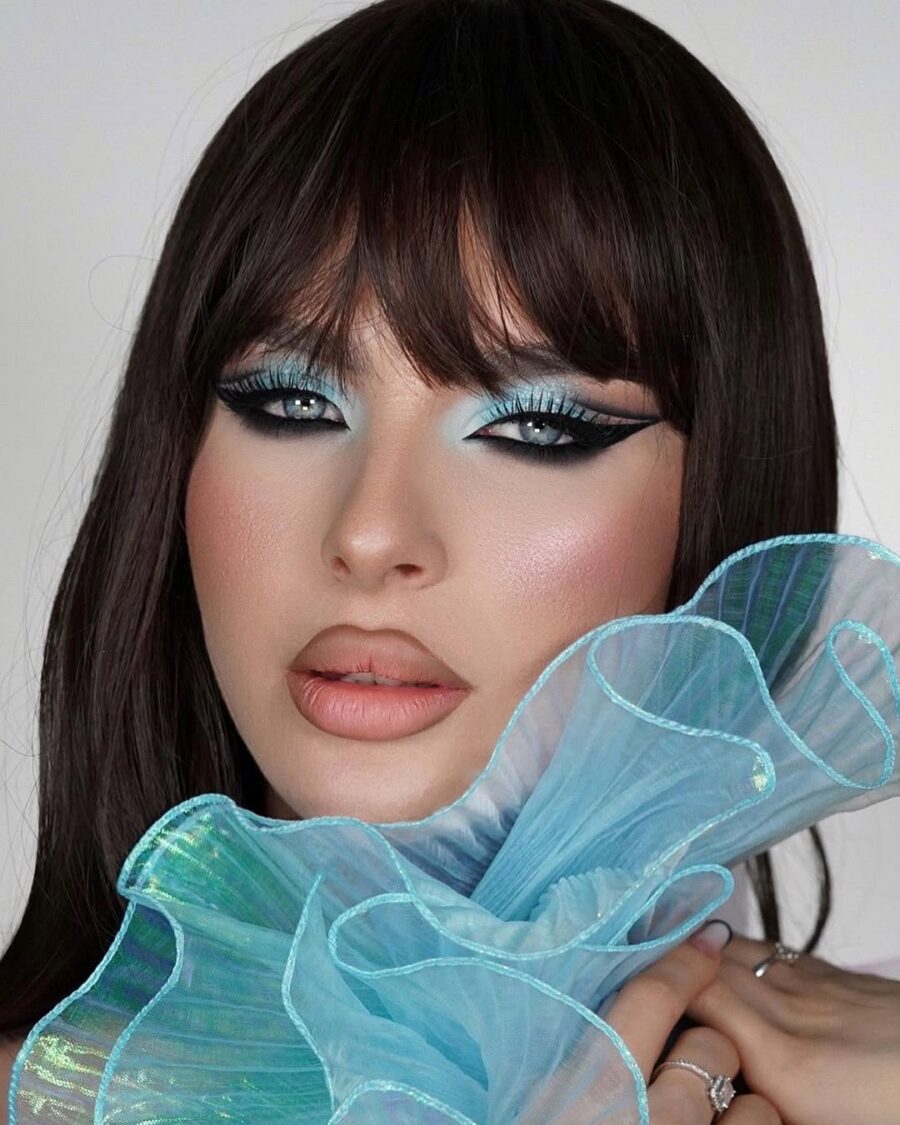 Aqua hues enhance blue eyes beautifully