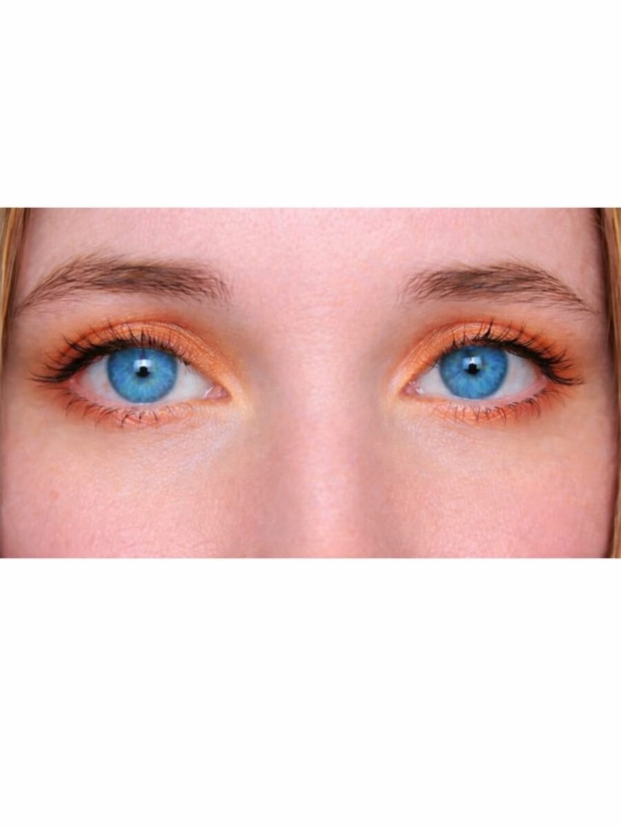 Vibrant Orange Shadow Enhances Blue Eyes