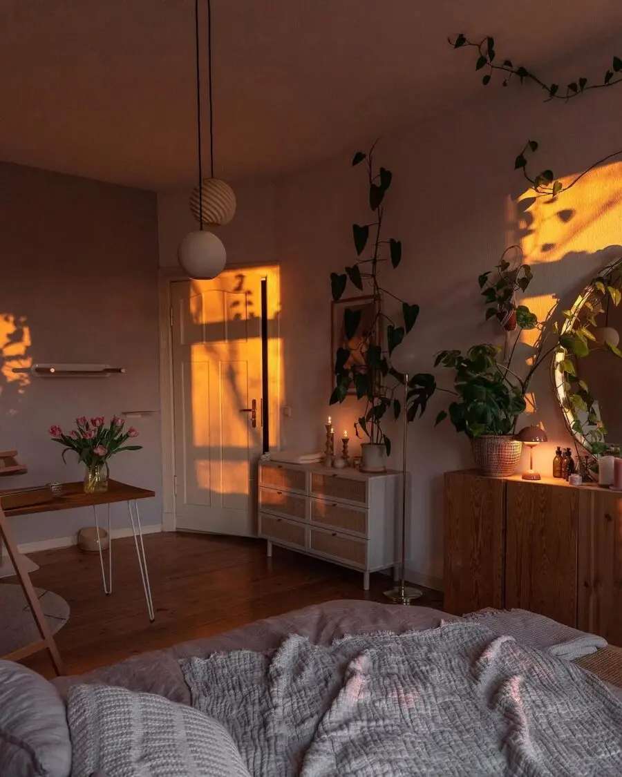 Cozy boho bedroom bathed in warm sunset glow