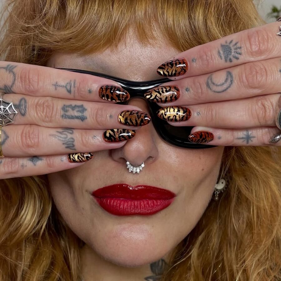 Vibrant tiger stripe animal print nails