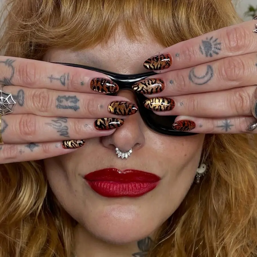 Vibrant tiger stripe animal print nails