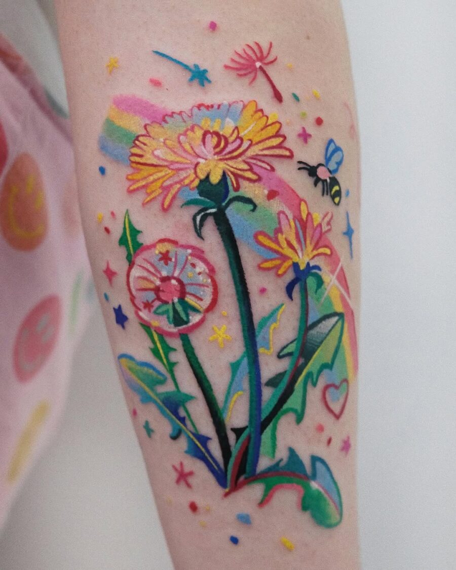 Vibrant floral tattoo with rainbow accents