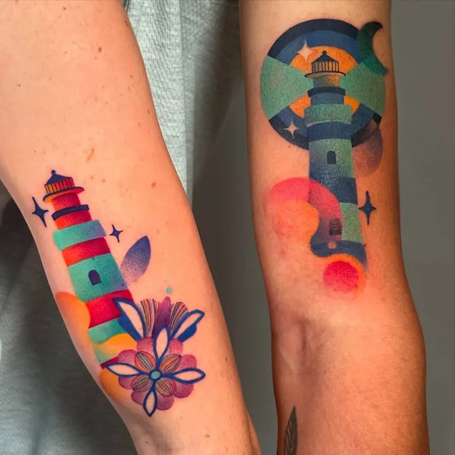 Vibrant lighthouse and floral tattoo design