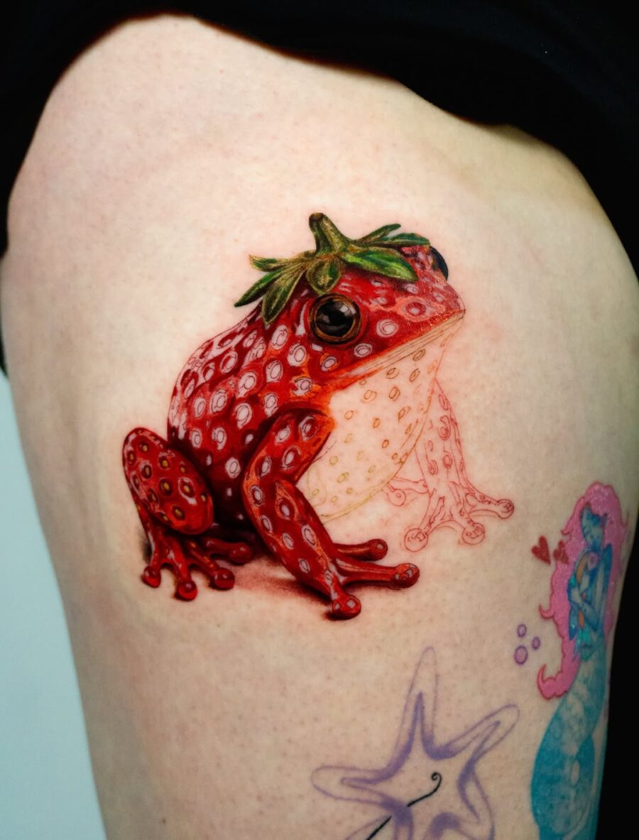 Vibrant Red Strawberry Frog Tattoo Creation