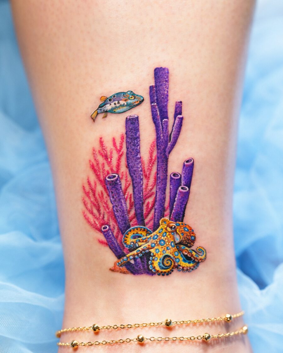Vibrant underwater scene tattoo featuring an octopus