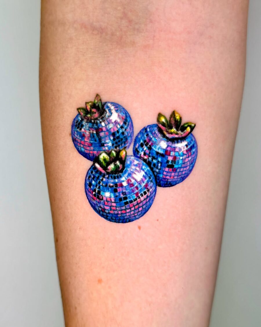 Vibrant pumpkin tattoos radiate playful energy