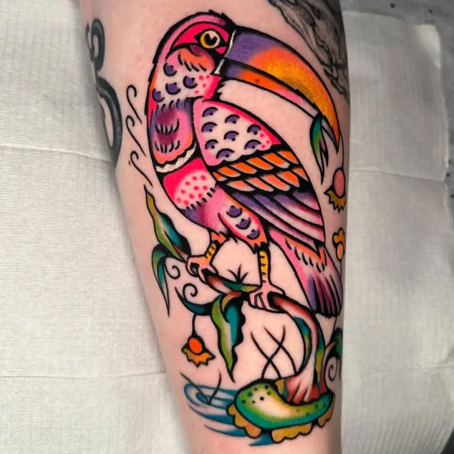 Vibrant toucan tattoo with intricate details