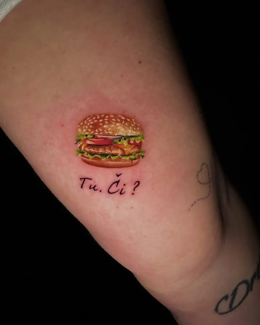Delightful burger tattoo with quirky text