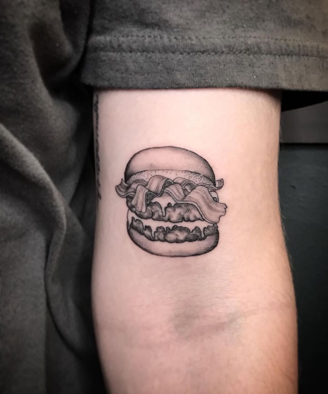 A deliciously detailed burger inked on skin