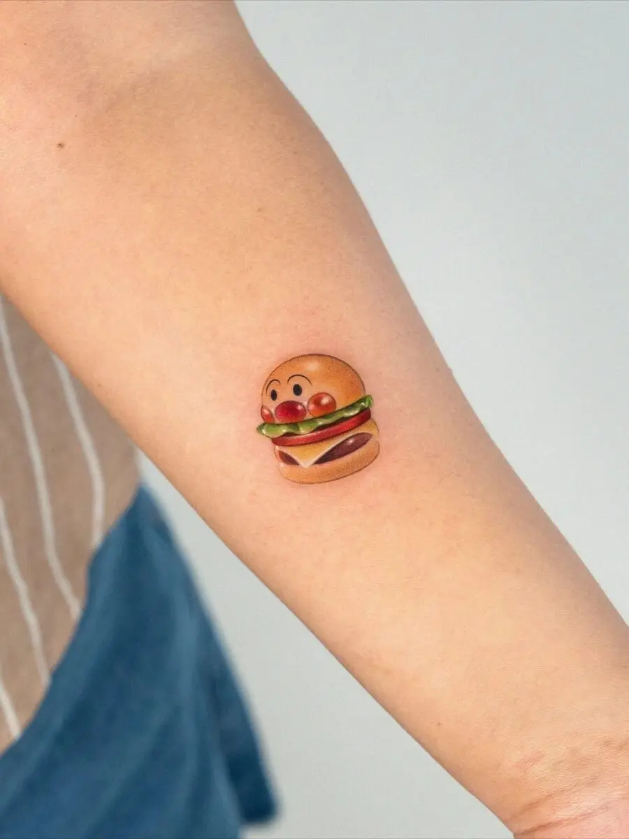 Playful burger tattoo with vibrant colors
