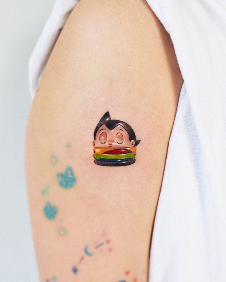 Cute character with a burger tattoo