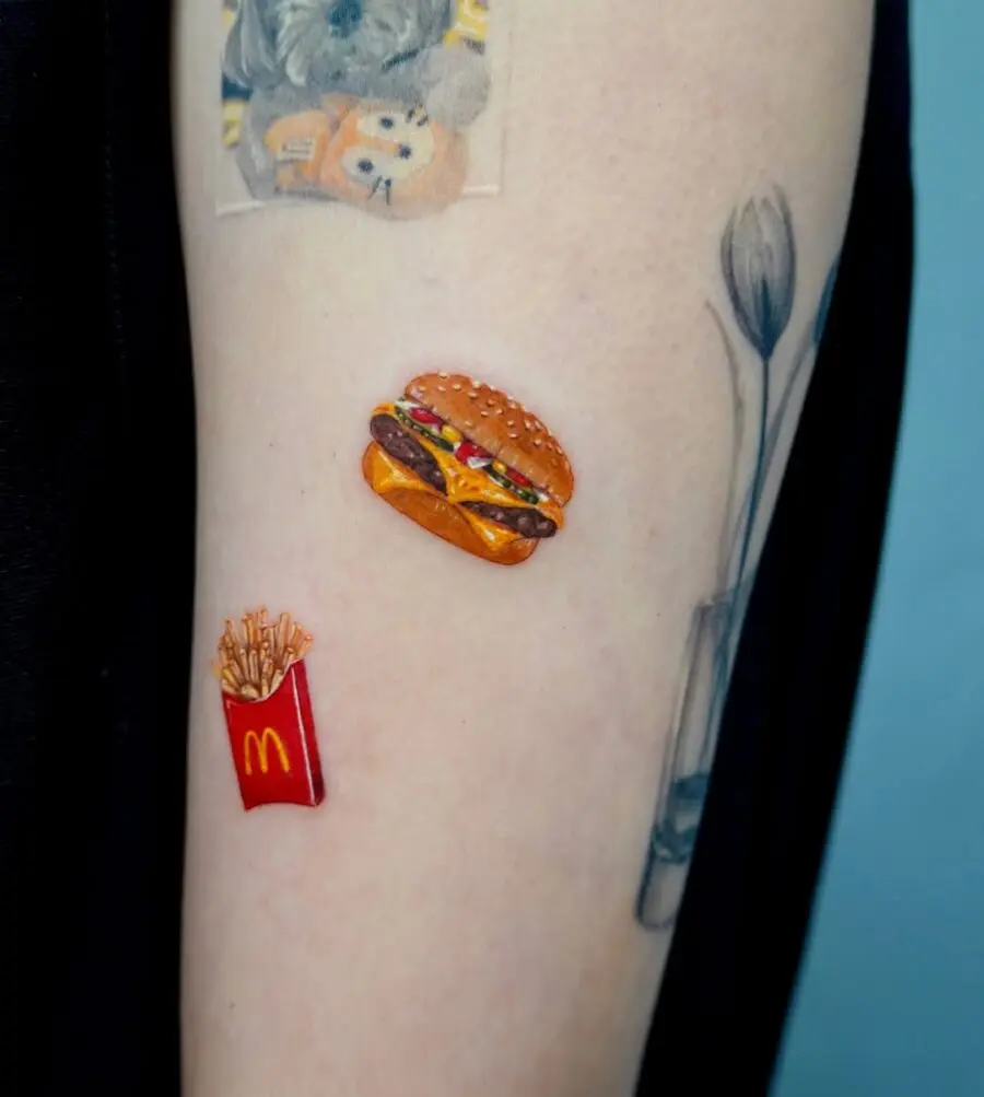Deliciously detailed burger and fries tattoo art