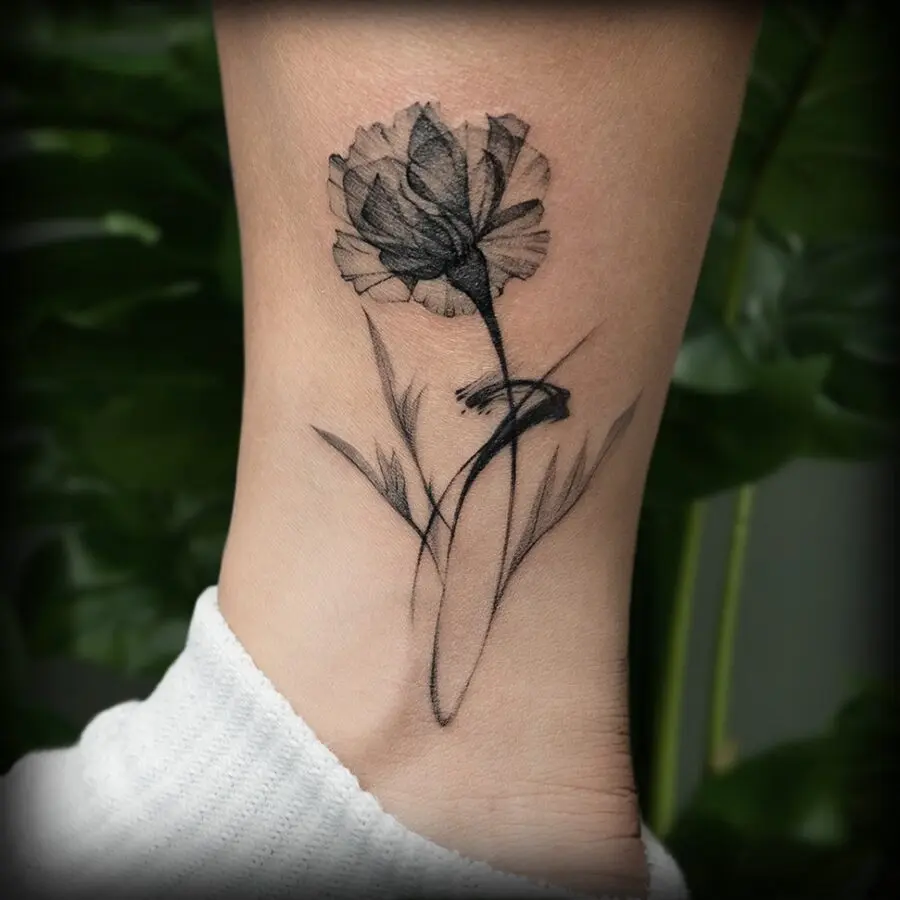 Artistic carnation tattoo in black ink design