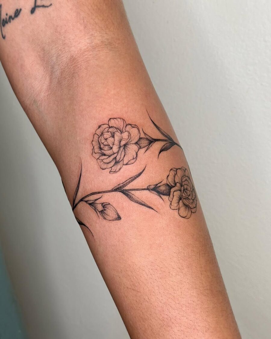 Beautiful carnation tattoo design on arm