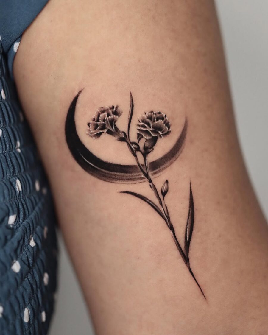 Elegant blackwork carnation tattoo design