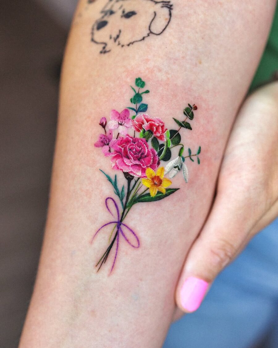 Vibrant bouquet of carnations and lush greens