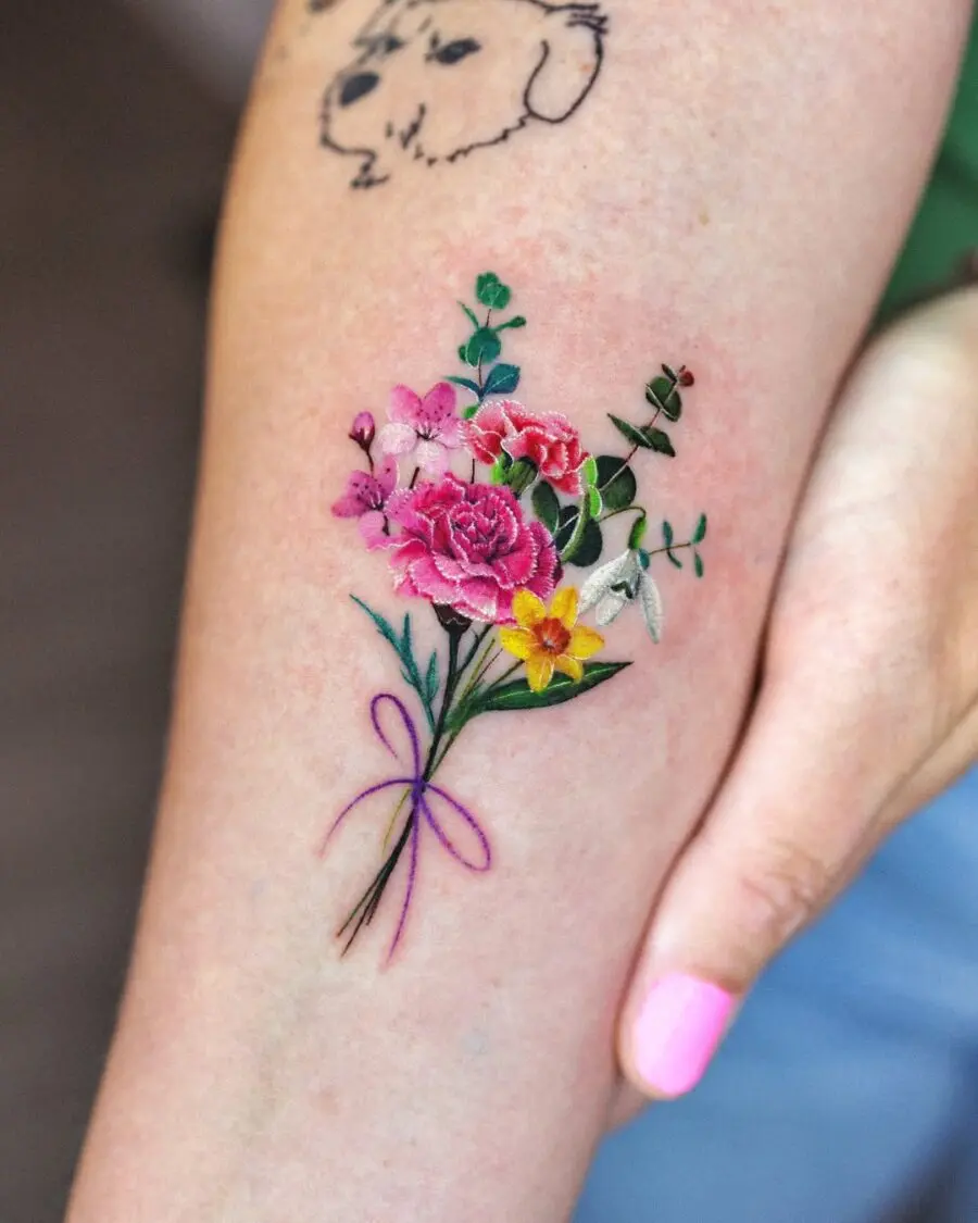 Vibrant bouquet of carnations and lush greens