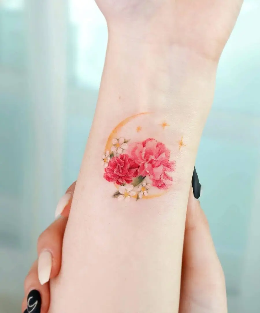 Vibrant Carnation Tattoo with Celestial Elements