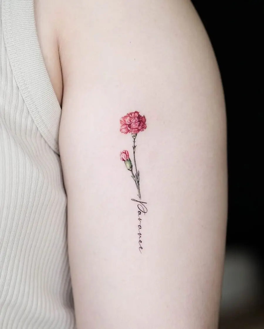 Elegant carnation tattoo with delicate lettering