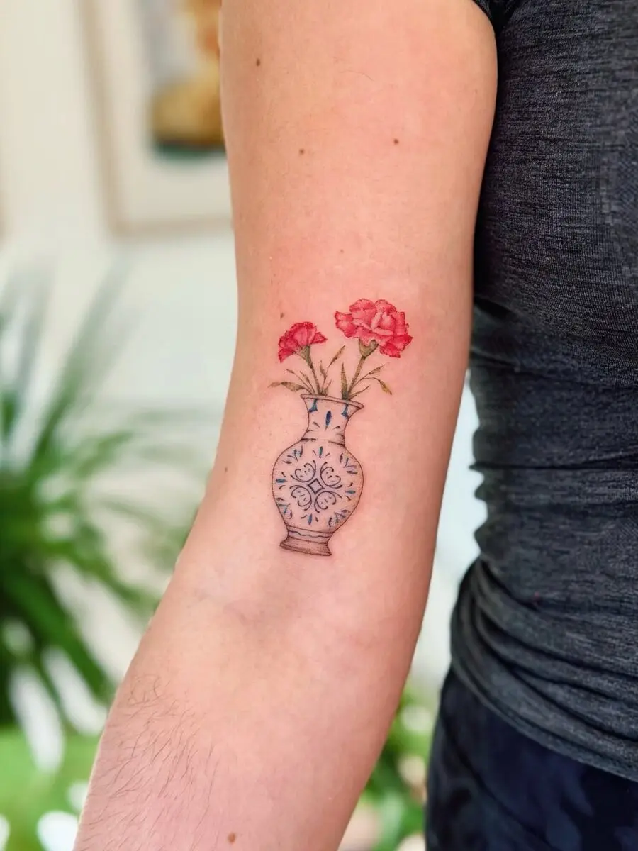 Charming carnation vase tattoo on arm