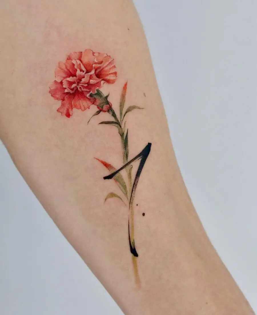 Vibrant carnation tattoo with delicate details