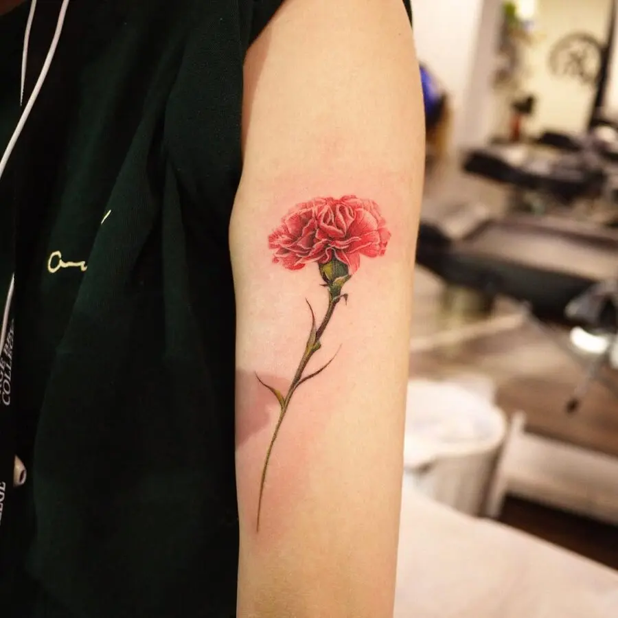 Vibrant Carnation Tattoo on Inner Arm