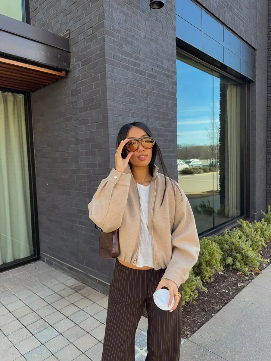 Stylish ensemble featuring brown wide-leg pants