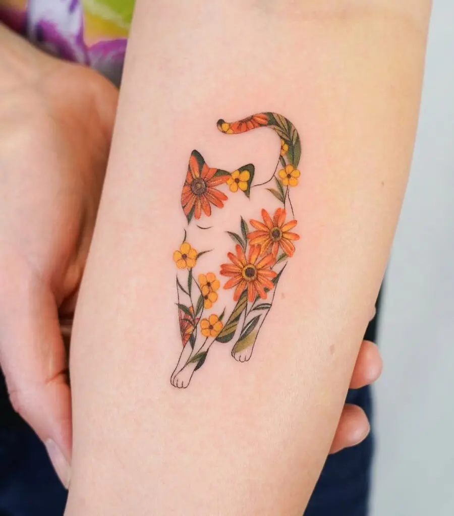 Whimsical floral cat tattoo design