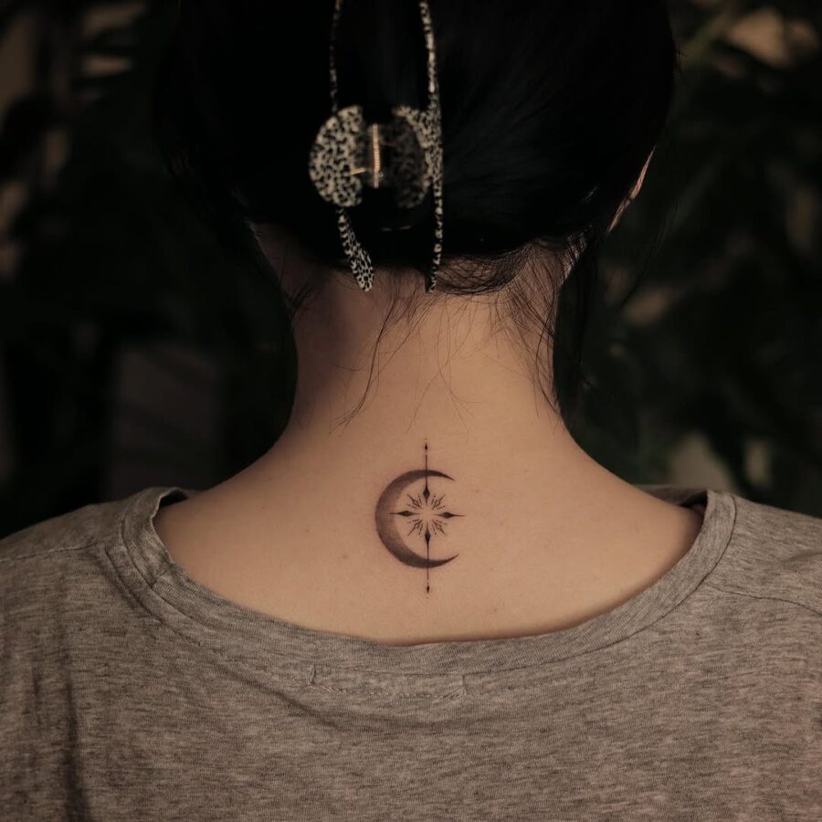 Elegant celestial tattoo on the back neck