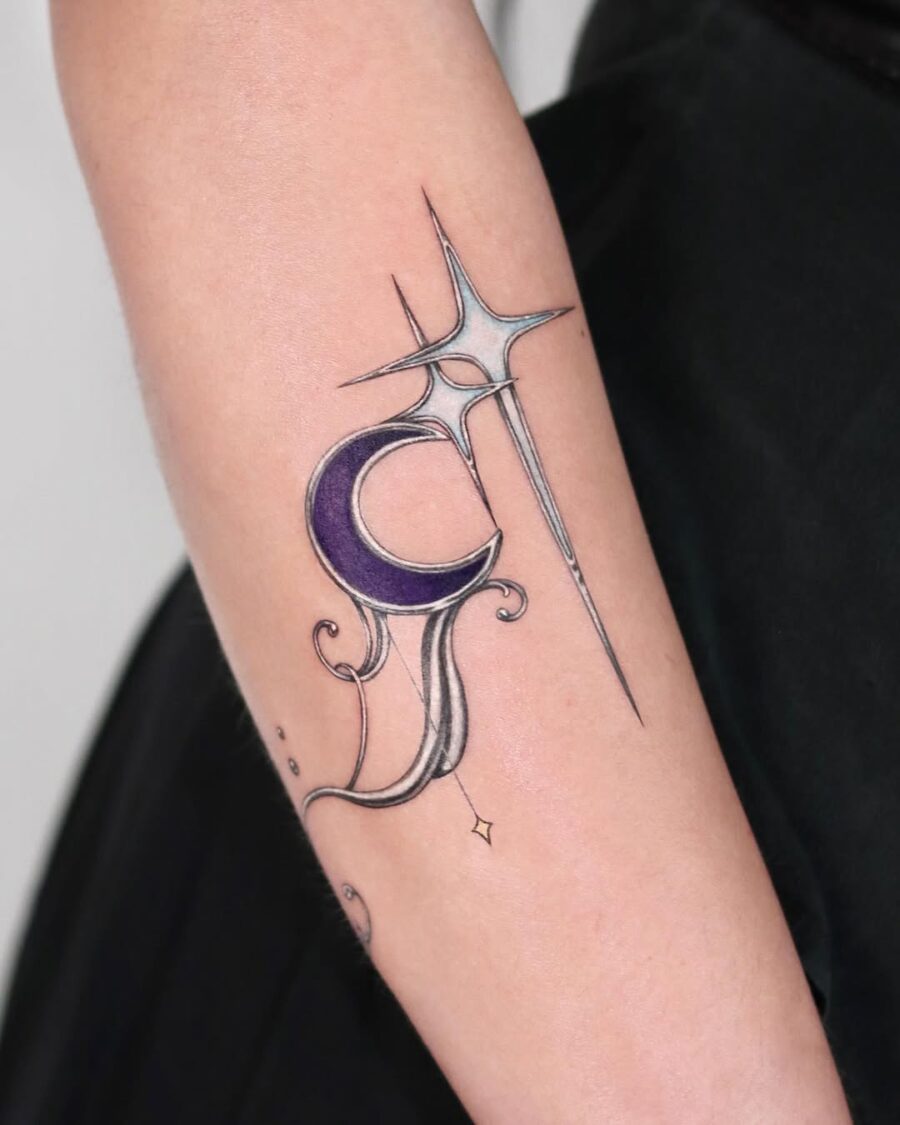 Elegant celestial tattoo featuring moon and star motifs
